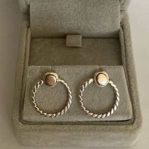 Sterling silver hoop earrings.